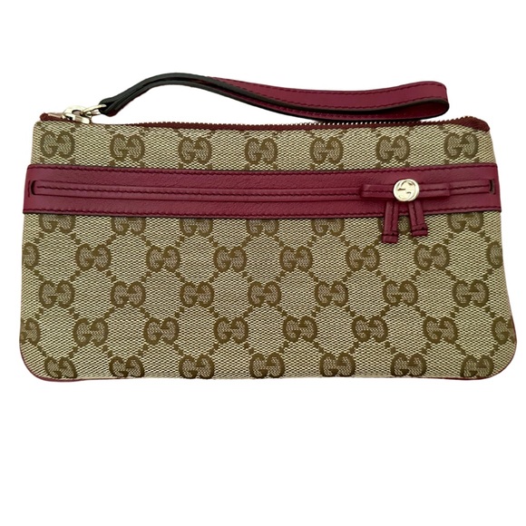 Gucci Monogram Wristlet with Red Bow Detail